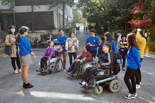Students gathered for mapping the campus for those with disabilities